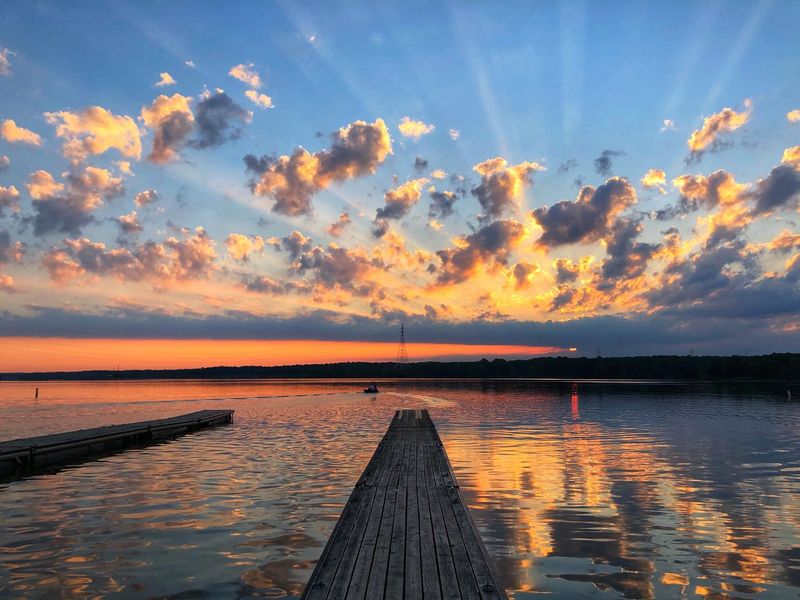 Sunrise And Sunset Views Over The Reservoir