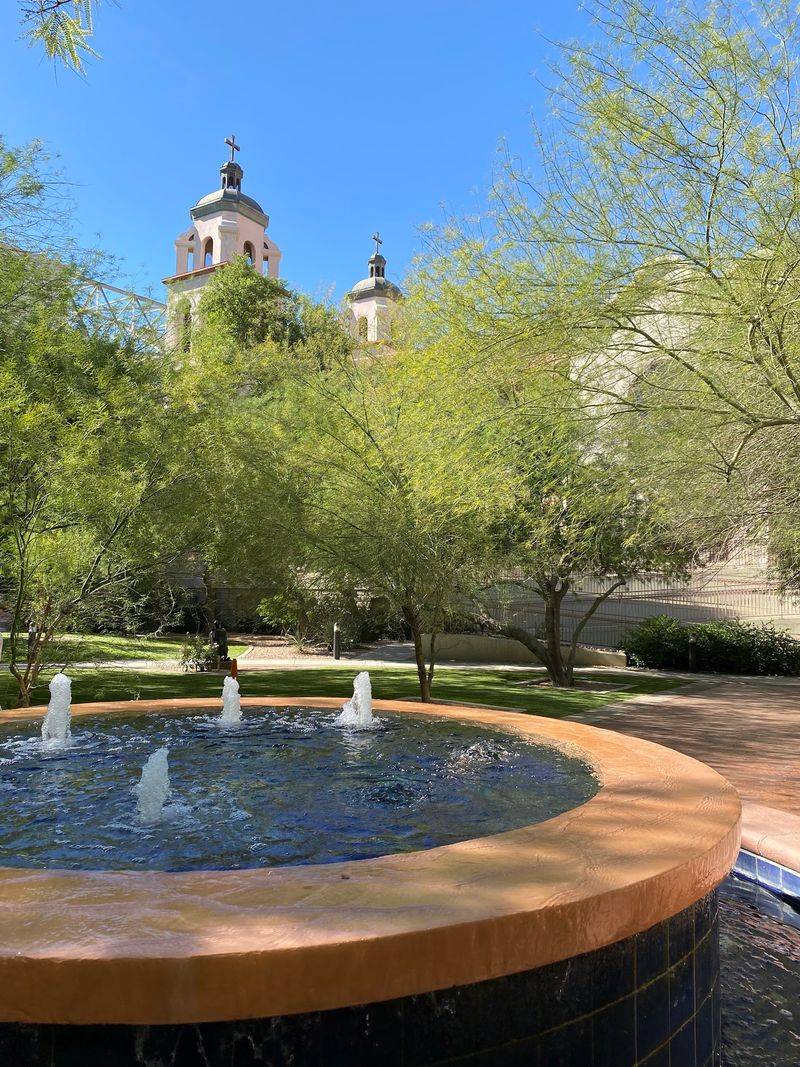 Plaza Fountains, Shade Trees, and Bronze Figures