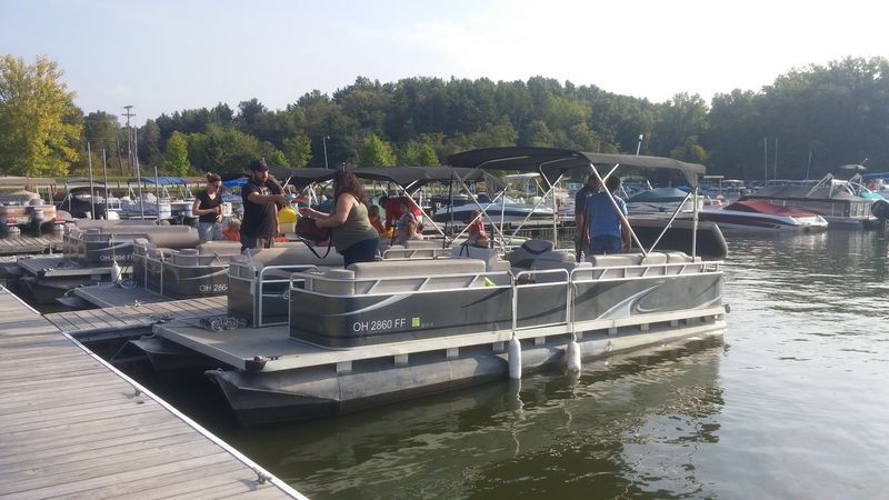 Pontoons, Kayaks, And Sails Sharing One Big Playground