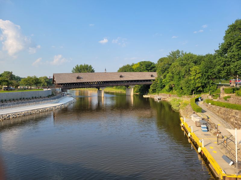 The Covered Wooden Bridge And River Drift