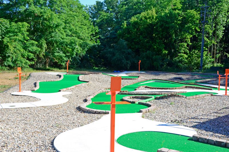 Putters, Mazes, And Tokens Keep Everyone Busy Between Climbs Putters, Mazes, And Tokens Keep Everyone Busy Between Climbs