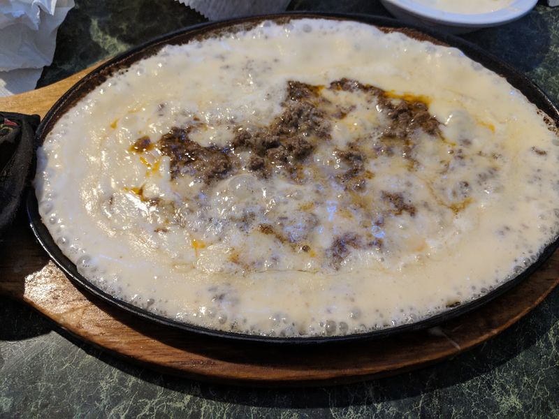 Queso Fundido With A Standing Fan Club
