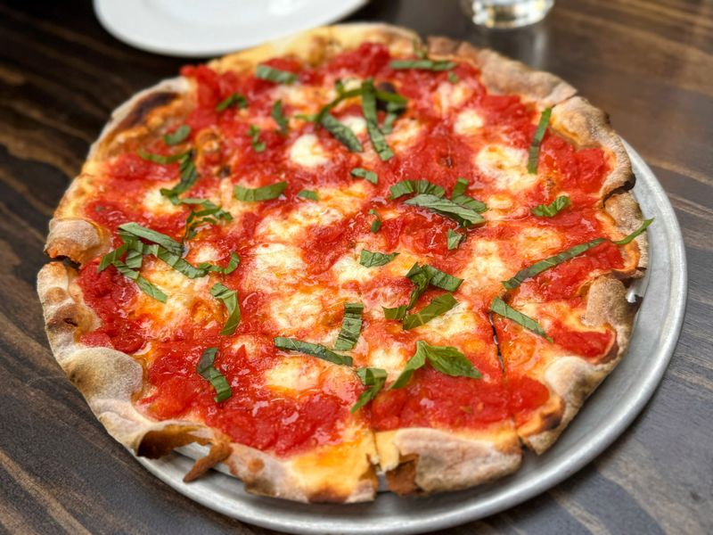 A Pizzeria Next Door For Thin Crust Cravings