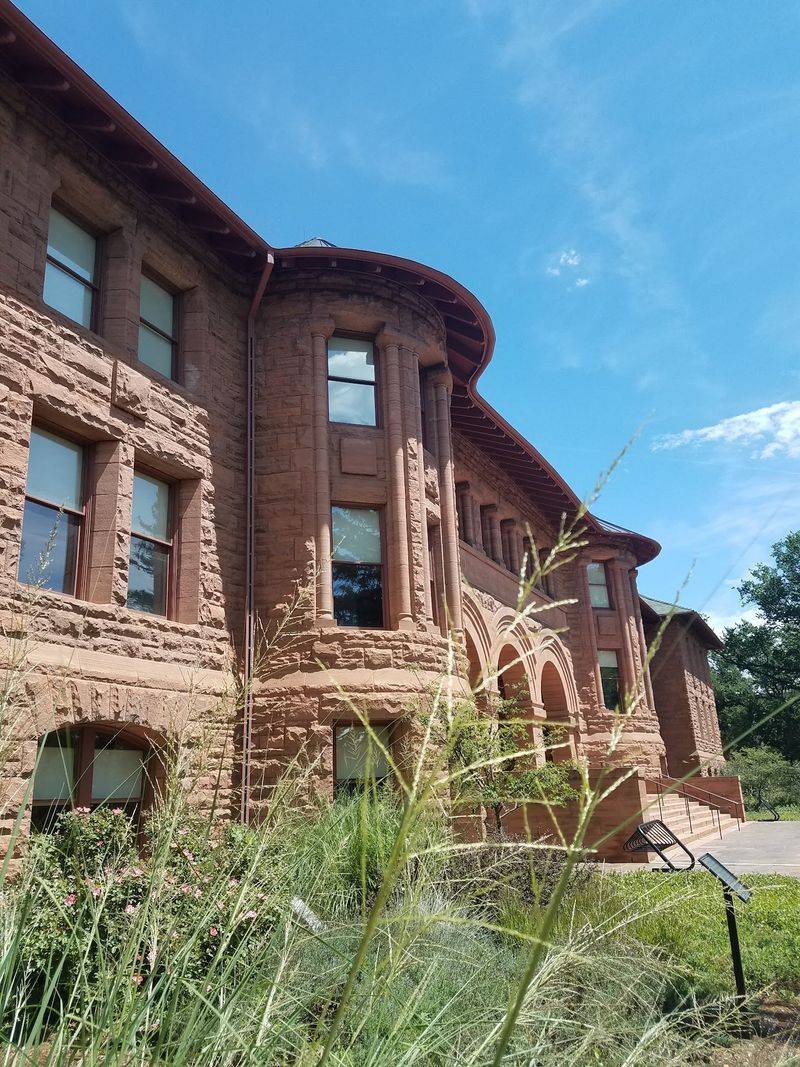 Red Sandstone And Big-Name Buildings Fill The Campus