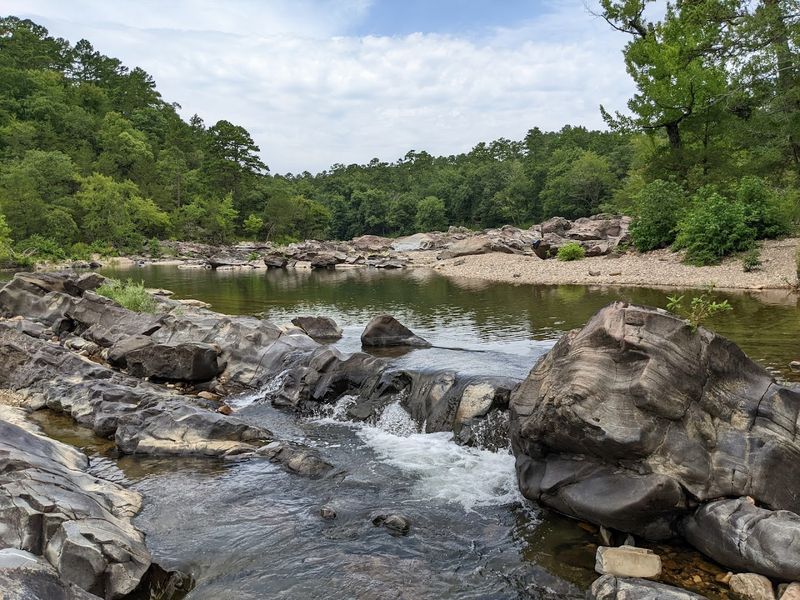 Rocky Ledge Drops Carved Through Jagged Bedrock