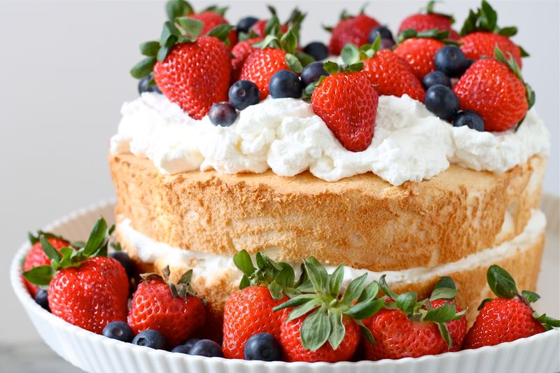 Heavenly Angel Food Cake with Whipped Cream and Berries