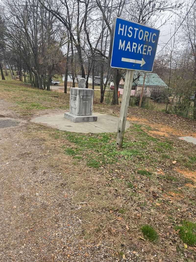 Weathered Historical Sign Near The Boundary Marker