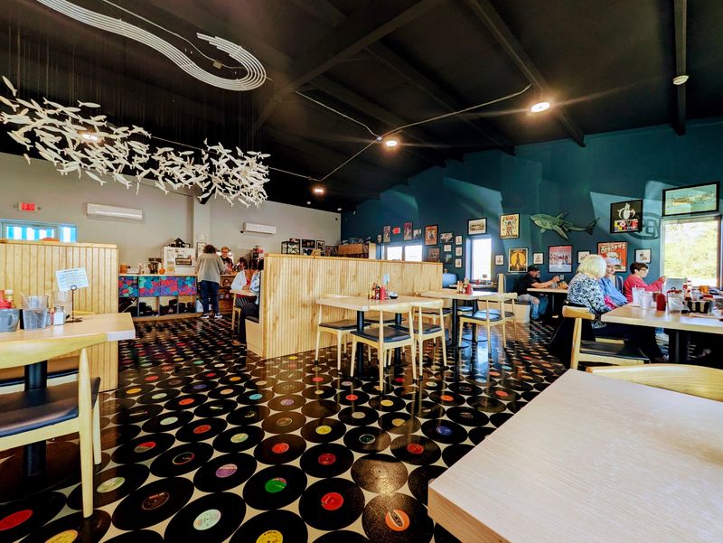 Sail-Shaded Patio Seating Extends The Experience
