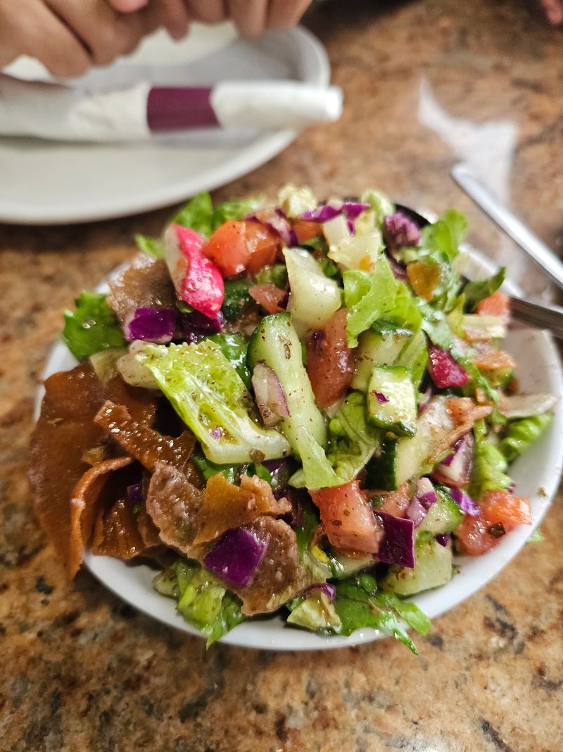 Salads And Grape Leaves Break Up The Richness