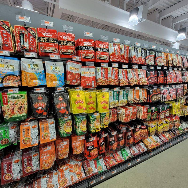 Sauces, Noodles, And A Wall Of Ramen