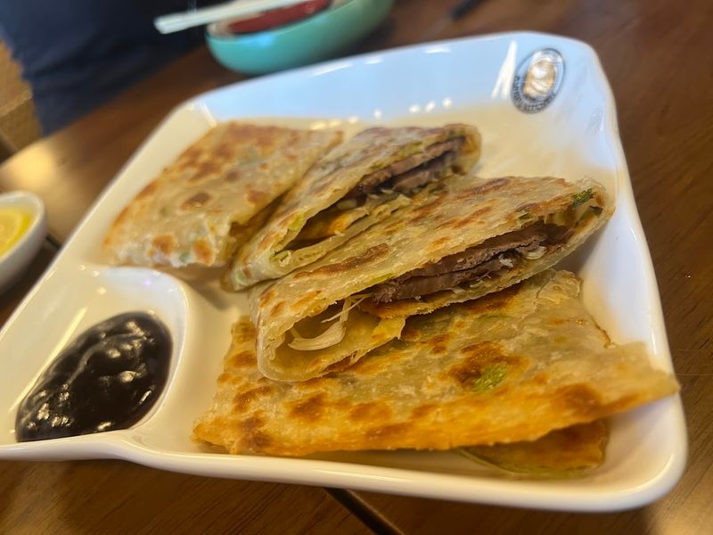 Scallion Pancakes With Braised Beef Are A Must-Order