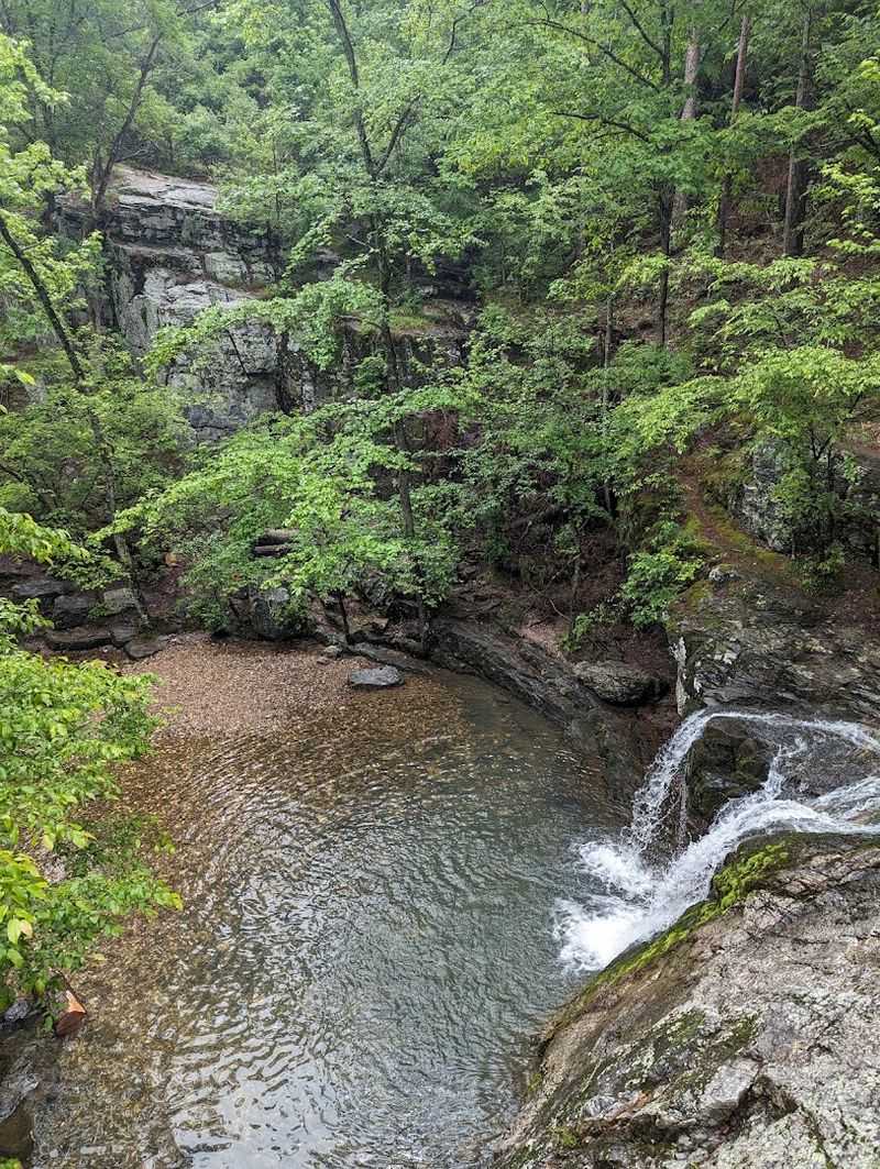 Short Woodland Trail Leading To A Quiet Waterfall