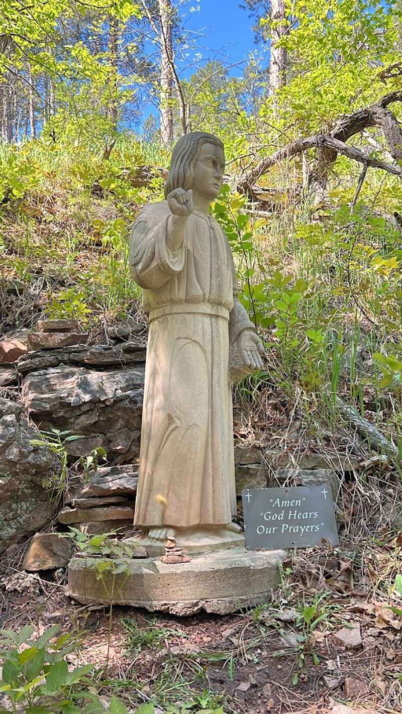 Seven Statues And A Forest Full Of Stillness