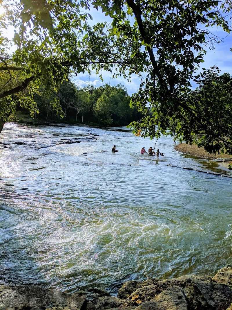 Shaded River Edges And Splashy Turns