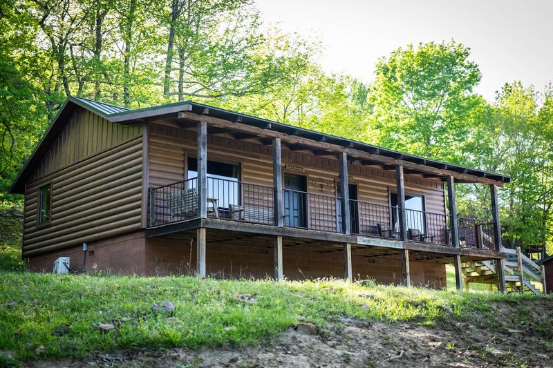 Cabins And Campsites Surrounded By Wild Terrain