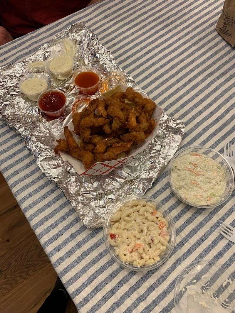Sides Like Coleslaw And Mac Salad Round Out The Menu