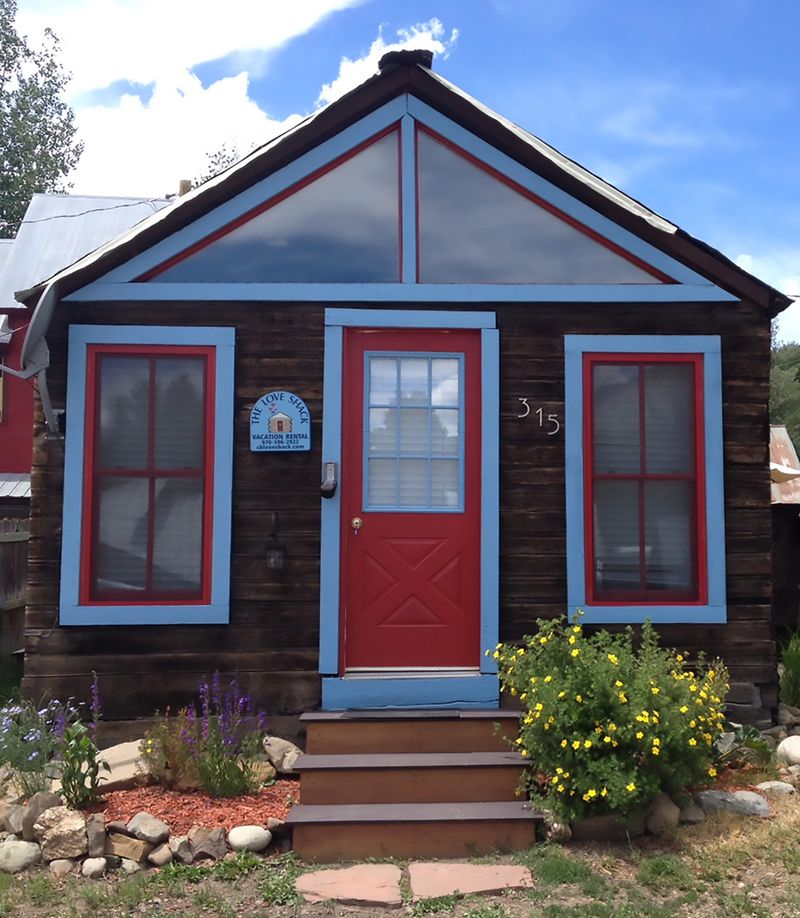 Colorful Mountain Homes Buried In Sparkling White