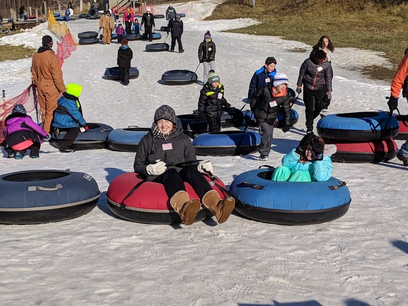 Skiing And Snow Tubing At The Local Slopes