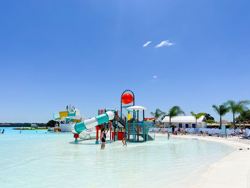 Slides, Sprinklers, And A Kids Zone That Buys Parents Time