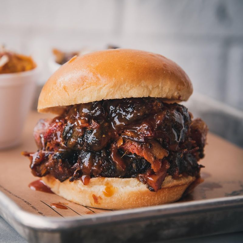 The BBQ Sauce On The Table Is A Game-Changer For Sandwich Lovers