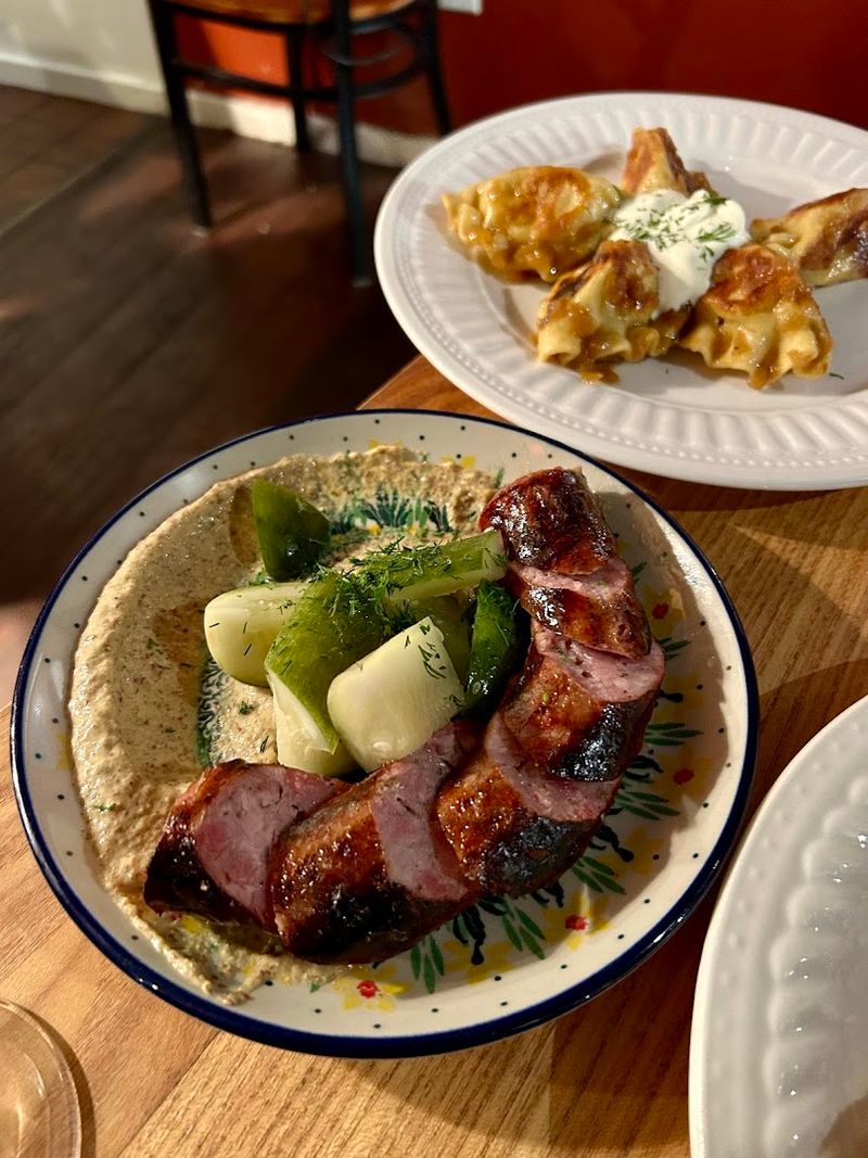 Kielbasa Served With Pickles And Mustard Is A Master Class In Simplicity