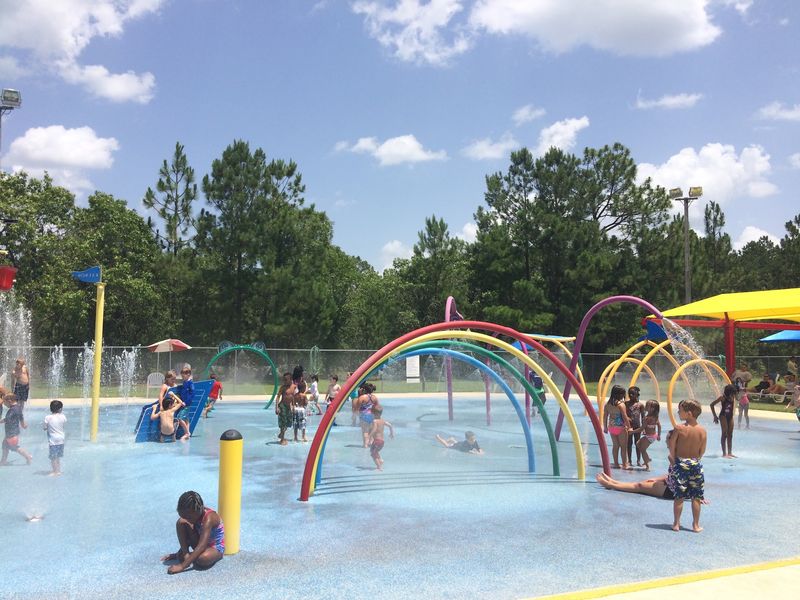Splash Pad, Climbing Wall, And Playground Fun