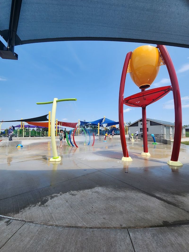 Splash Pad Moments Beside The Playground