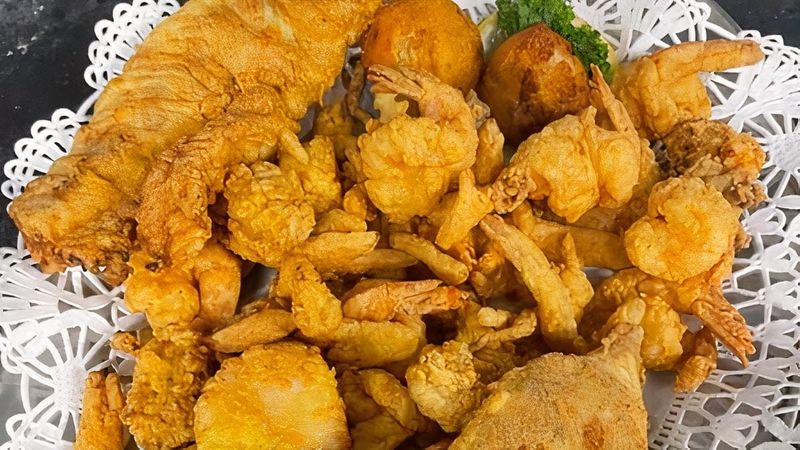 Eating Fresh Shrimp And Seafood