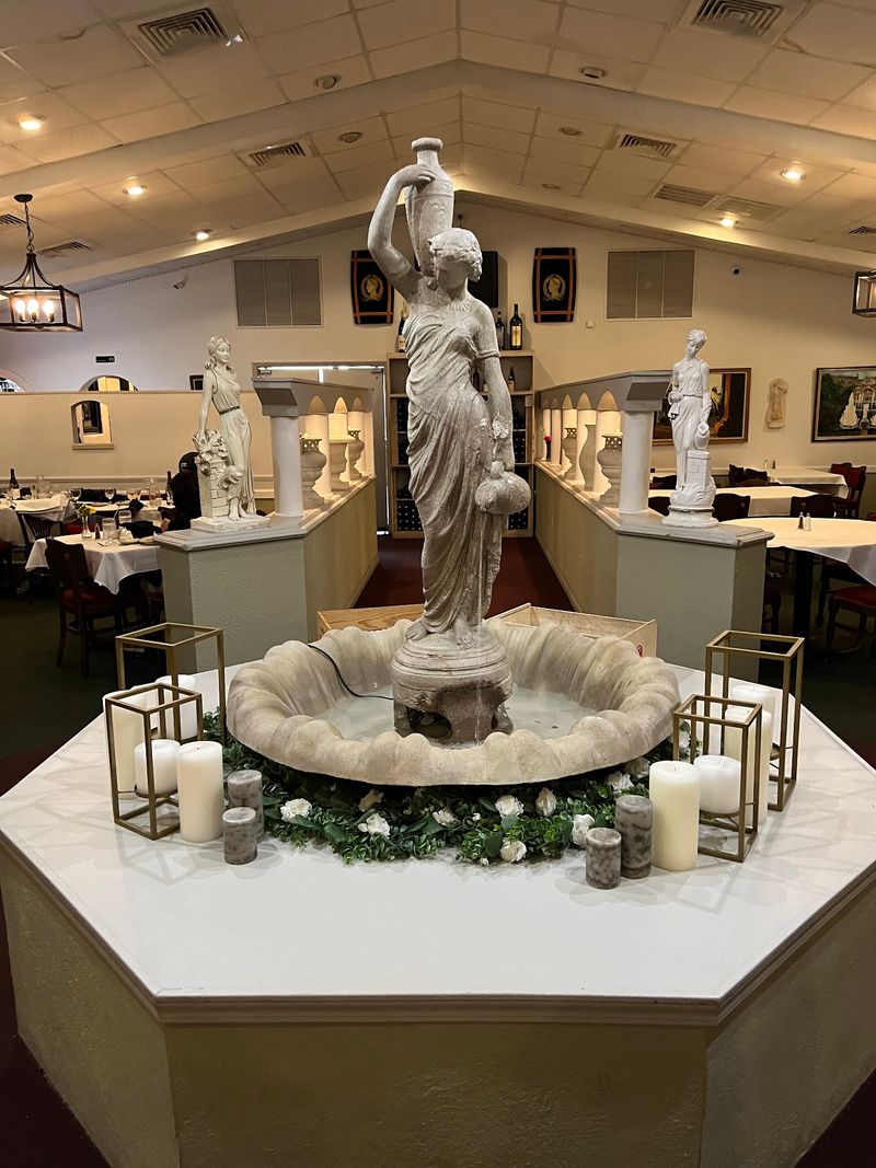 Statues, Columns, And A Fountain Set The Mood