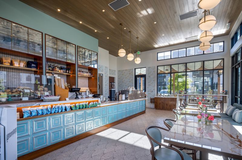 Sunlight Fills The Stylish Café Interior Sunlight Fills The Stylish Café Interior