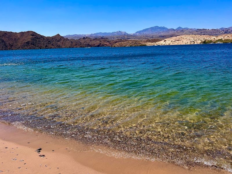 Swimming In Clear, Calm Desert Waters