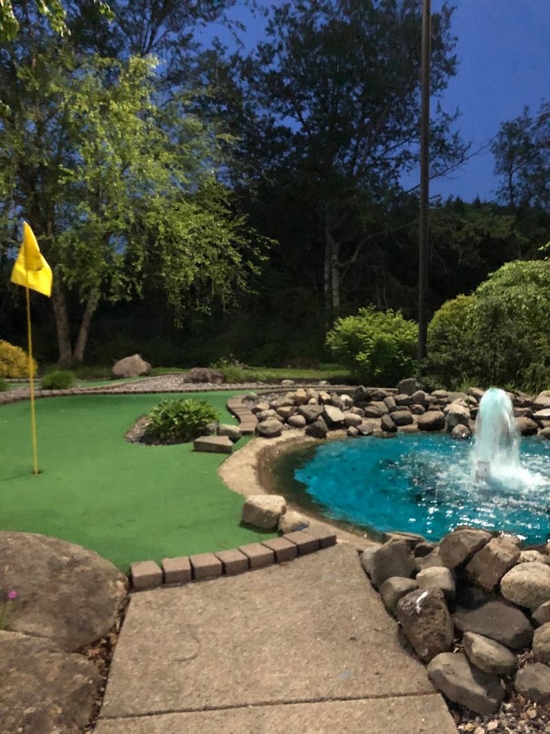 Teeing Off At Peek'n Putt Miniature Golf
