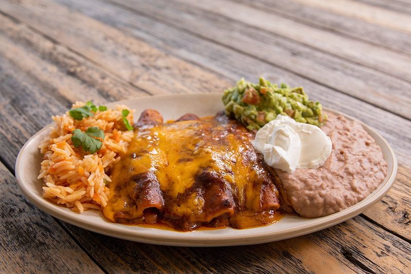 Tex-Mex Enchiladas Drowning In Sauce