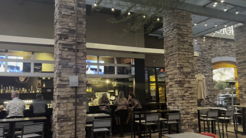 The 30-Foot Indoor/Outdoor Bar Is A Real Centerpiece