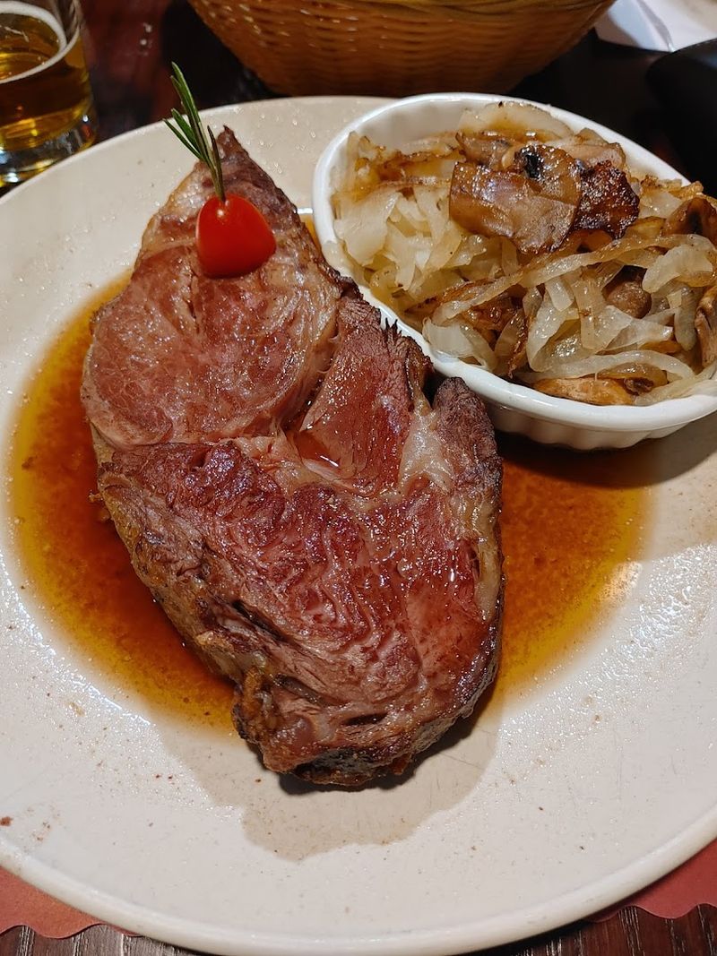 The Prime Rib Is Thick, Perfectly Cooked, And Absolutely Legendary