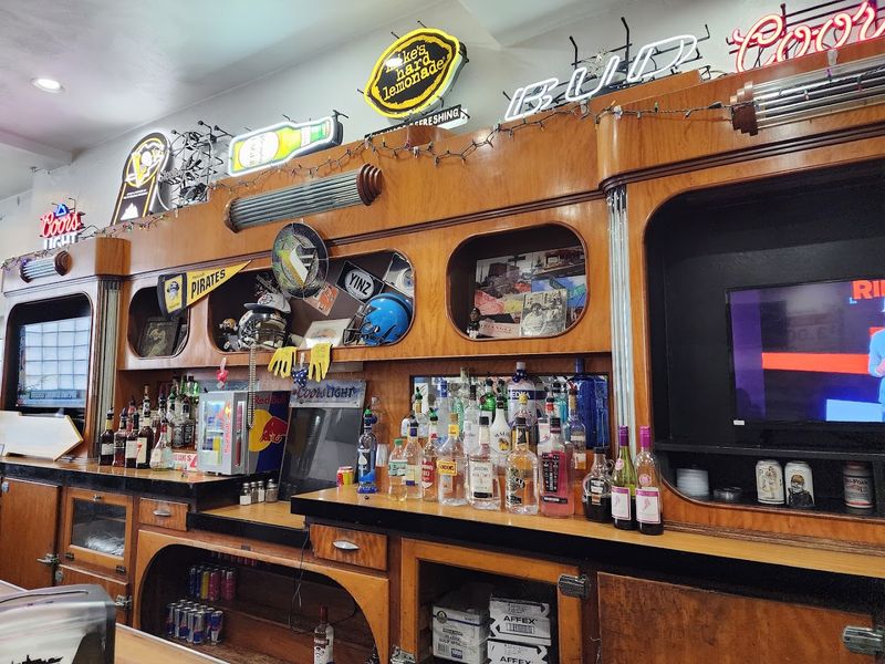 The Atmosphere Inside A Bar From Another Era