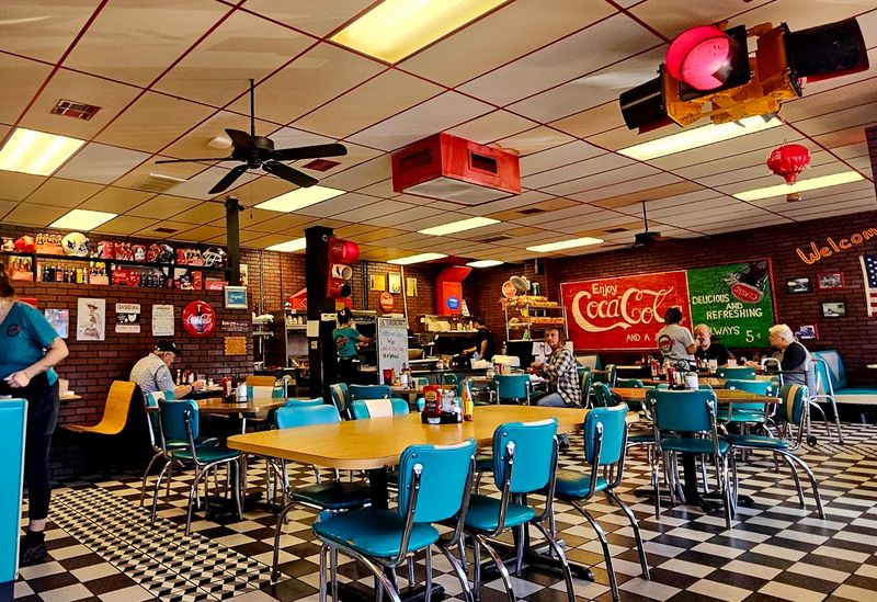 The Checkerboard Floor Sets The Retro Mood