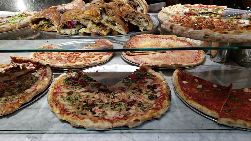 Brick-Oven Pizza That Comes In Massive Slices