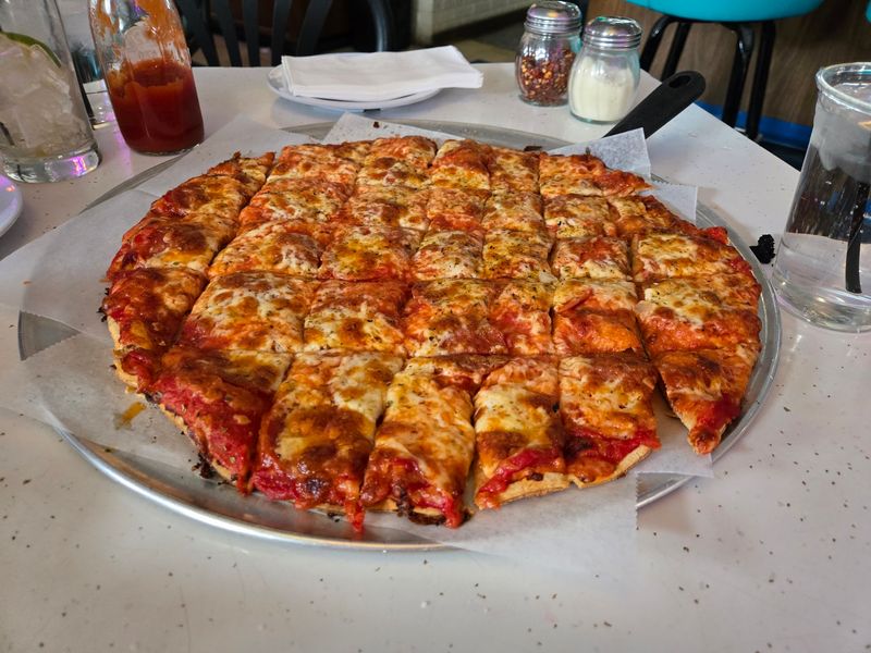 The Cracker-Thin Crust That Defines It