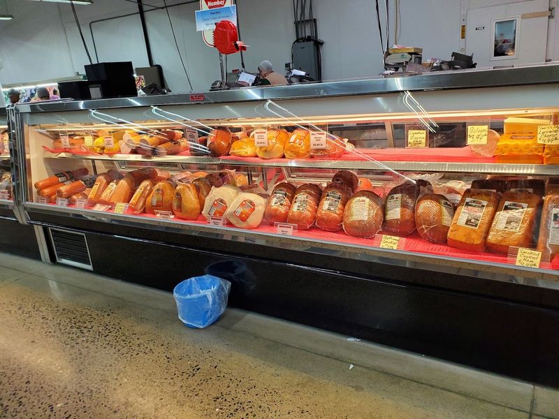 The Deli Counter Offers Fresh Meats, Hoagies, And Cheese