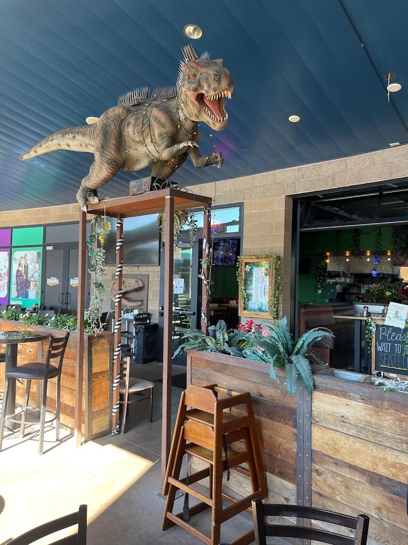 The Dinosaur Photo Booth Is A Must-Stop Moment