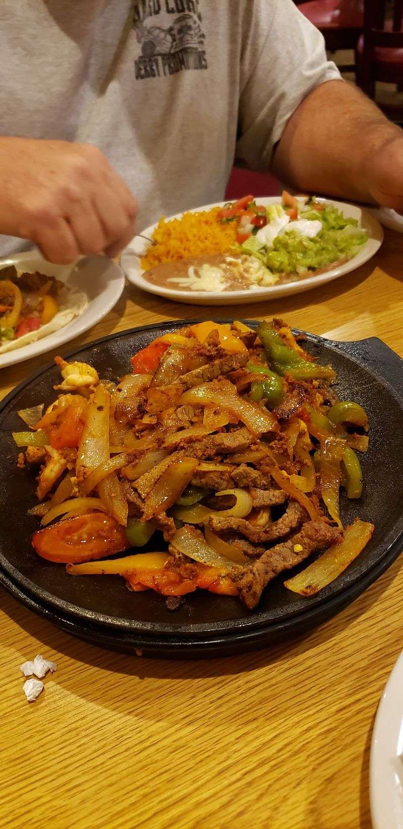 The Fajitas Arrive Sizzling And Loud The Fajitas Arrive Sizzling And Loud