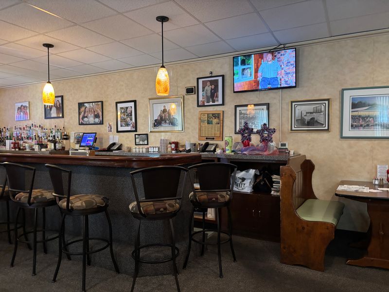 Cozy Atmosphere With Rustic Charm and Family Photos on the Walls