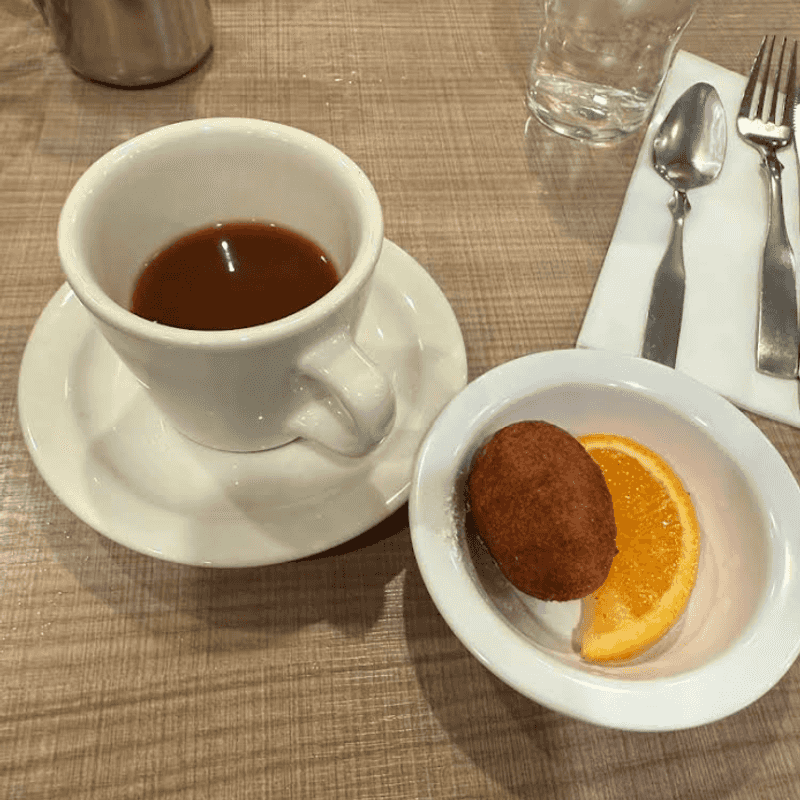 The Free Donut Hole and Orange Wedge Welcome
