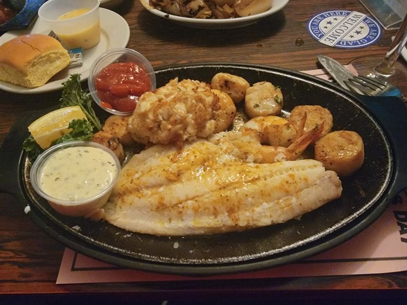 The Fried Seafood Platter Comes With A Crabcake Upgrade You Shouldn't Skip