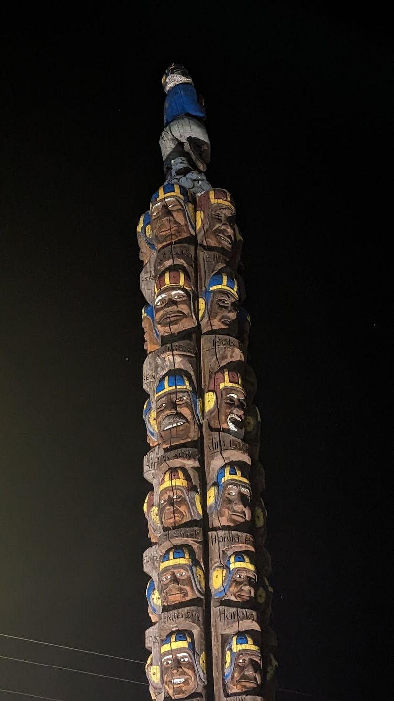 The Giant Carved Pole With a Football Grudge