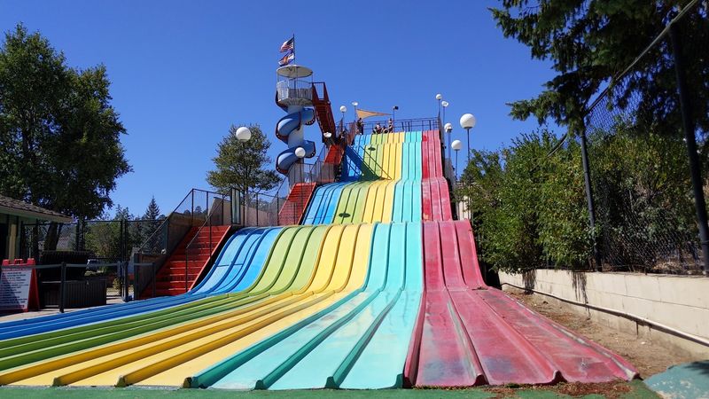 The Giant Rainbow Slide Still Carries The Old-School Flag