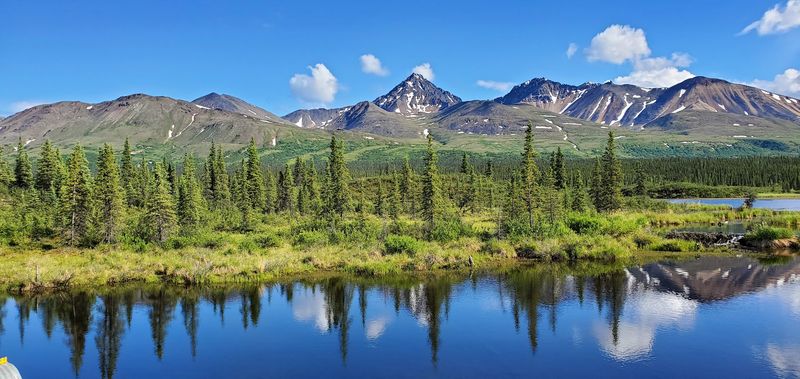 Reflective Lakes That Mirror The Sky Like Nature's Screensaver