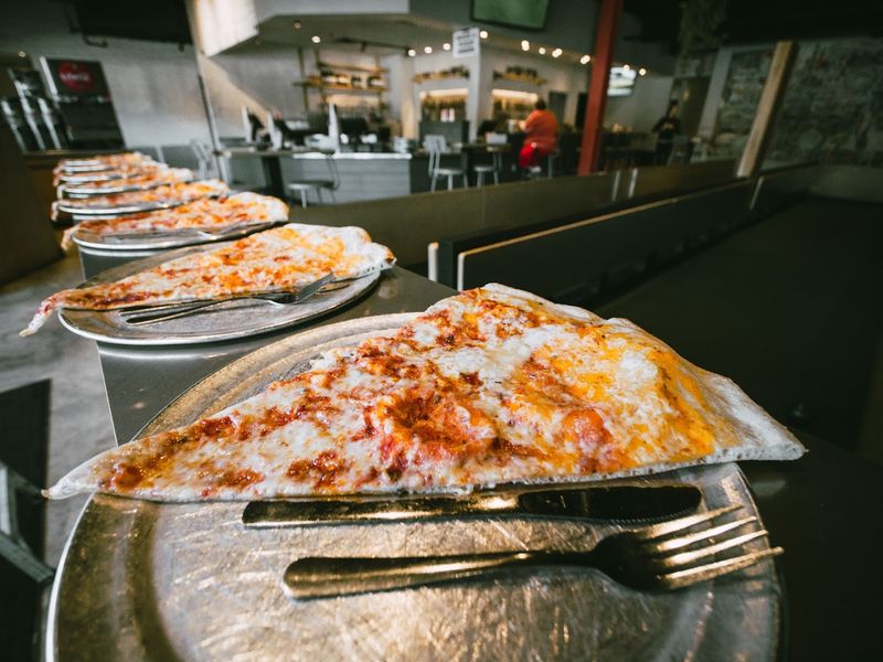 The Jumbo Slices That Redefine What A Pizza Slice Should Be The Jumbo Slices That Redefine What A Pizza Slice Should Be