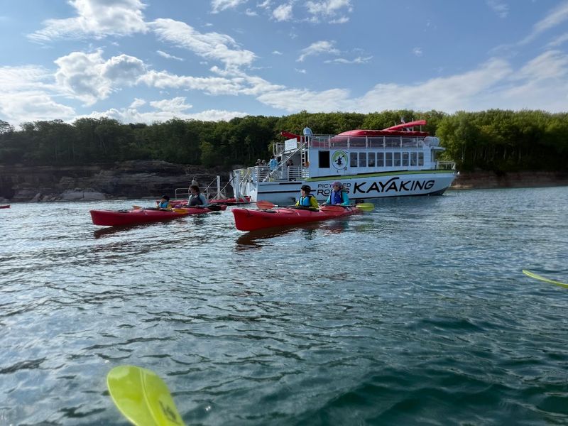The Kayaks Leave Town On A Boat